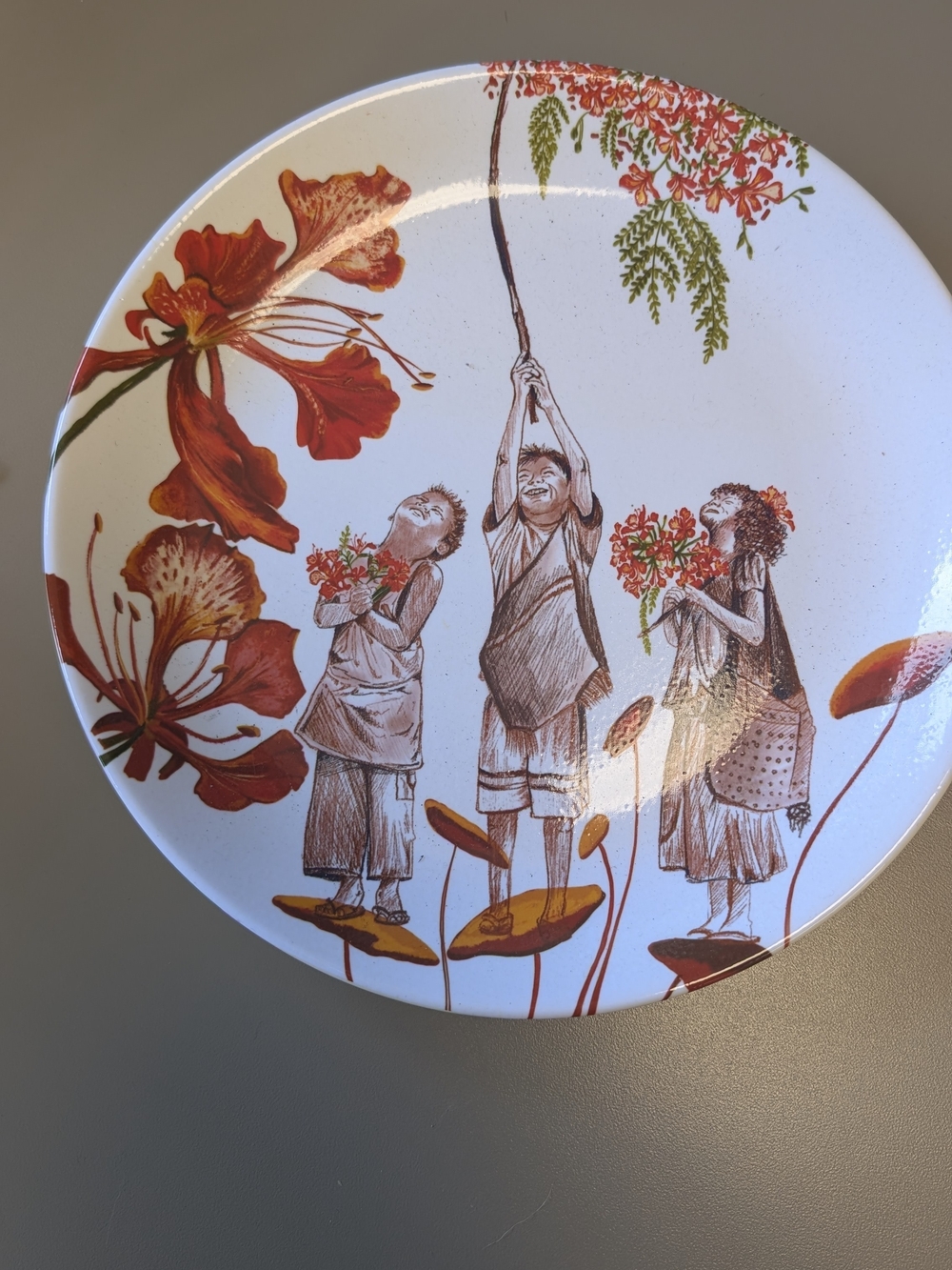 Hand-Painted Ceramic Decorative Plate — White with Red Floral & Children Motif